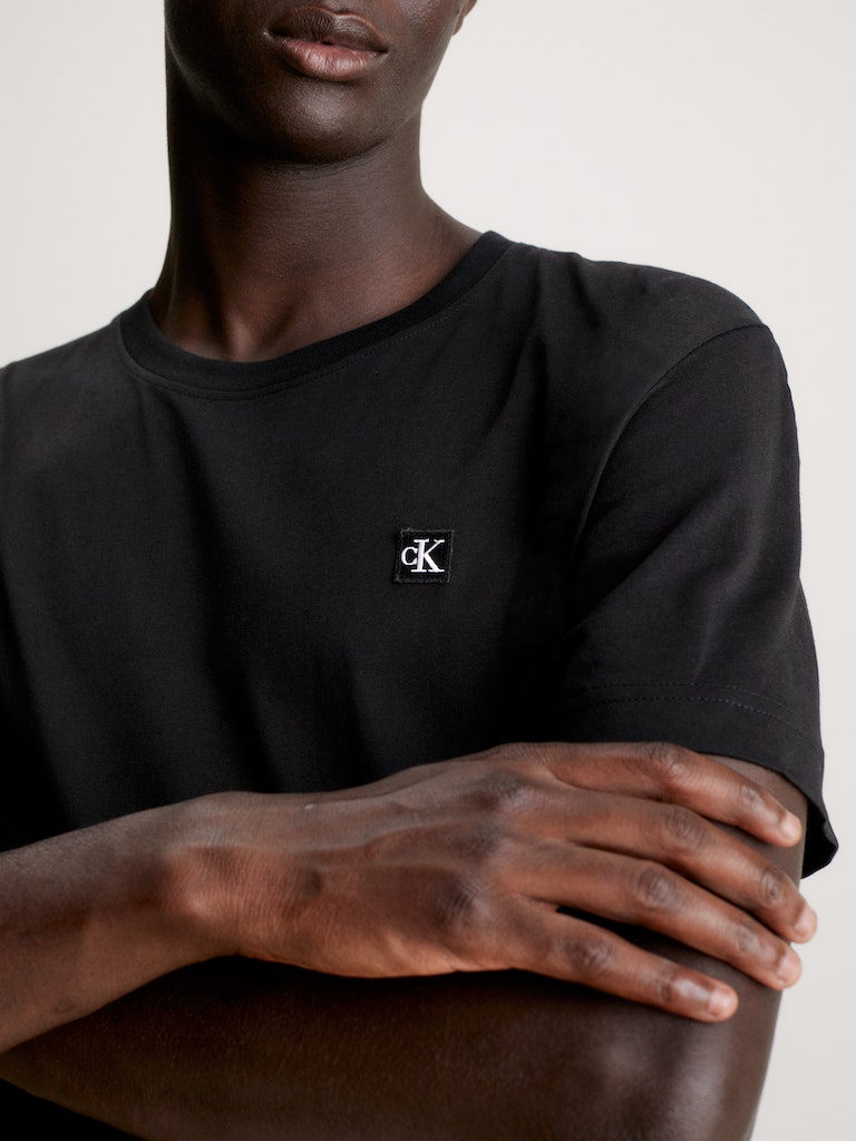 CK EMBRO BADGE TEE