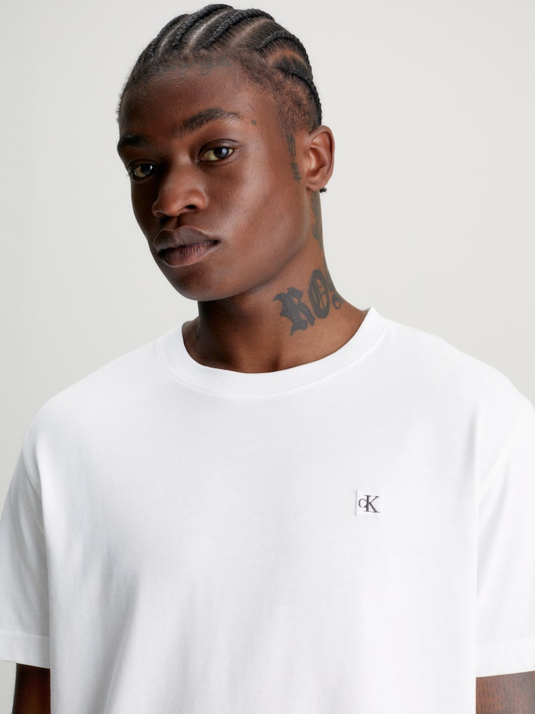 CK EMBRO BADGE TEE