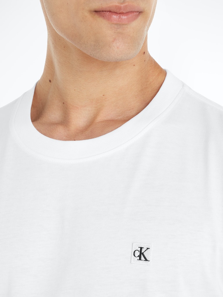 CK EMBRO BADGE TEE